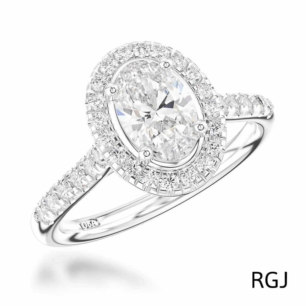 The Skye Platinum 0.91ct Oval Cut Diamond Engagement Ring With 0.39ct Diamond Halo And Diamond Set Shoulders