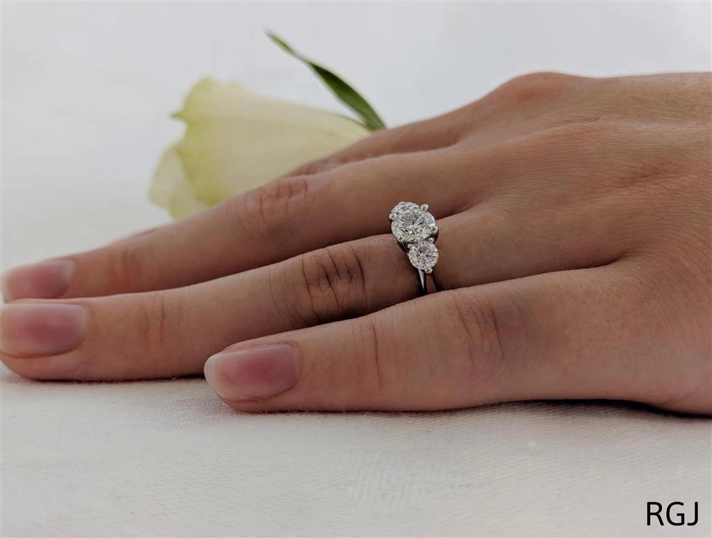 The Tulip Platinum 1.10ct Round Brilliant Cut Diamond Three Stone Engagement Ring