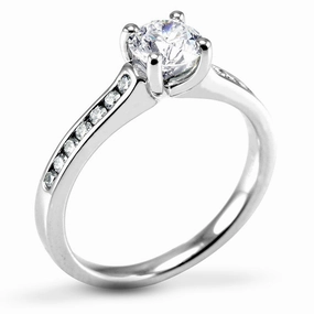 The Waterlily Platinum Round Brilliant Cut Diamond Solitaire Engagement Ring With Diamond Set Shoulders